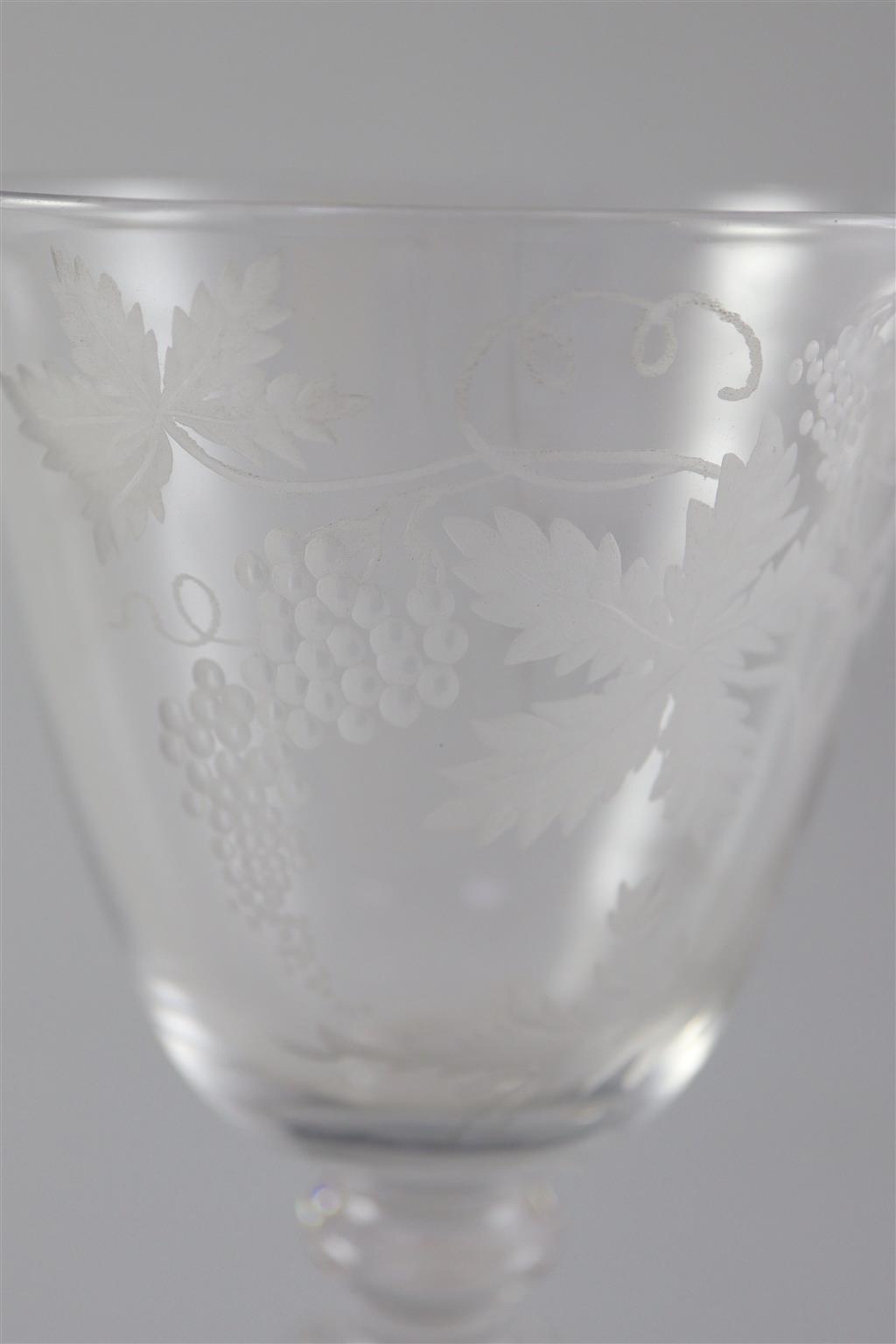 A cotton stem goblet, English or Dutch, c.1765-70, with Beilby design engraving, 19.5cm high